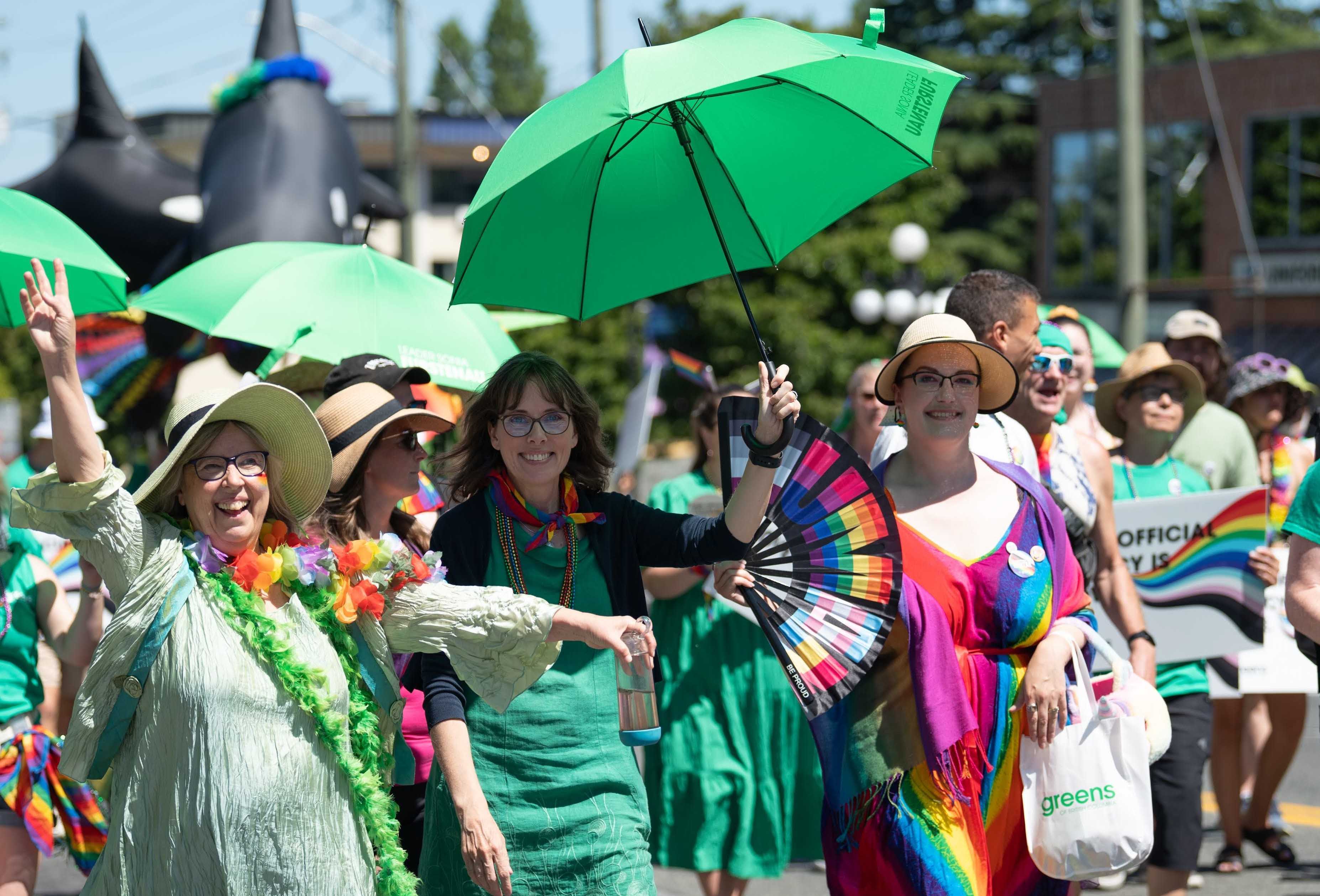 A group of people in the Victoria Pride Parade.